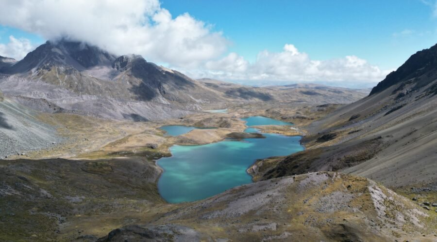 7 Lakes of Ausangate — turquoise Andean lagoons surrounded by snow-capped mountains near Cusco, Peru.