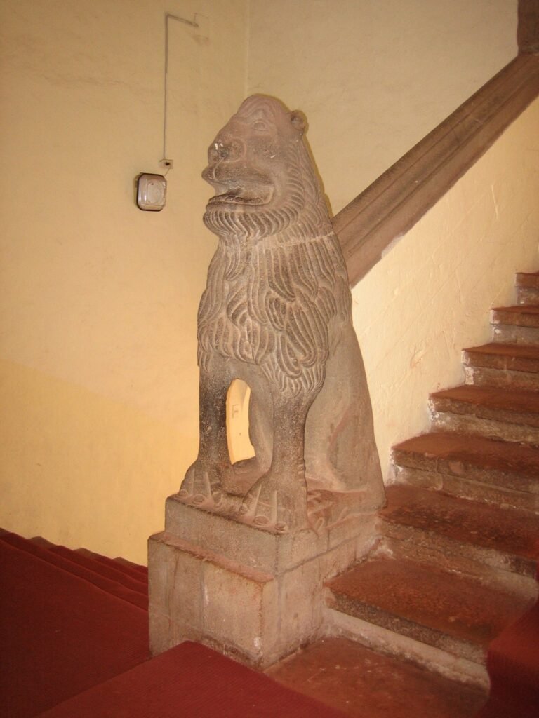Exterior view of the Inka Museum in Cusco with colonial architecture and stone walls.