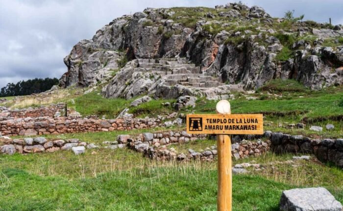Inca carved rock altar inside the Temple of the Moon cave in Cusco.