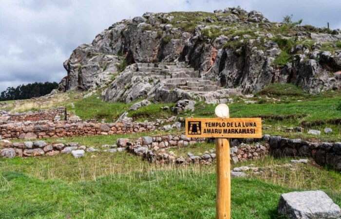 Inca carved rock altar inside the Temple of the Moon cave in Cusco.