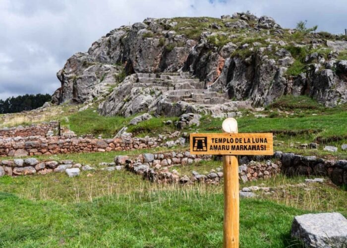 Inca carved rock altar inside the Temple of the Moon cave in Cusco.