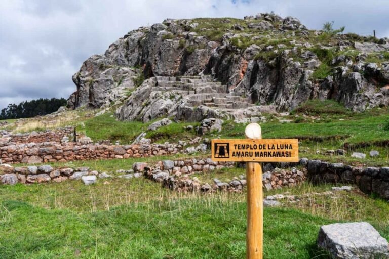 Inca carved rock altar inside the Temple of the Moon cave in Cusco.