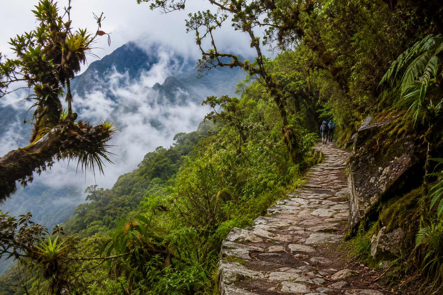 Mountain scenery and ancient ruins along the Inca Trail Routes.